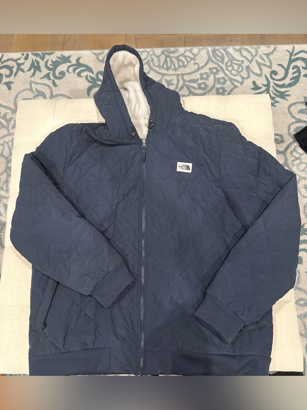 The North Face Men’s Quilted Hooded Jacket in Navy Blue